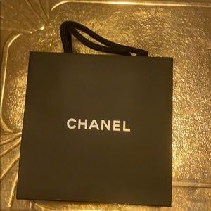 Chanel empty shopping bag.